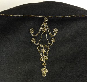 Detail of couched embroidery on back of neck of coat.© The University of Glasgow and Dumfries Museum.